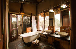 Rhino Post Safari Lodge - Bathroom and Outdoor Shower