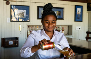 Ichingo Chobe River Lodge Bar lady