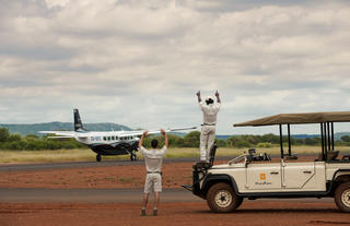 Morukuru Family Madikwe - waving our guests goodbye at Madikwe East airstrip