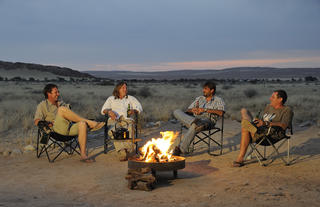Relaxing at a camp fire