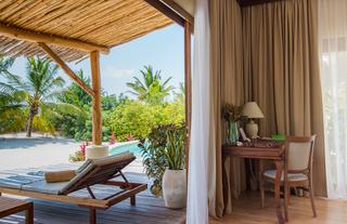 Desk and lounge chairs on deck