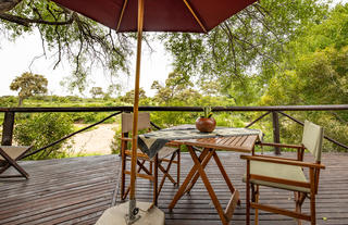 Bar deck overlooking watering hole and dry riverbed