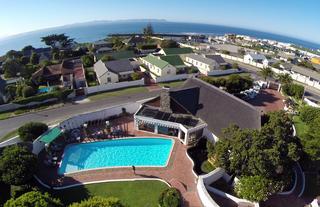 Birds eye view from Whale Rock to the nearby ocean and harbour