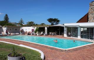 WhaleRockLodge_Pool&lounging_area_guestsswimming