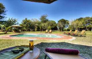 Enjoy a cold beverage at the pool side