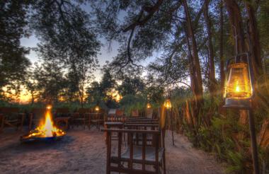 Enjoy a nightcap beside the warmth of the glowing fire pit