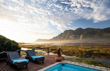 Relax by the pool with a wide expanse of mountain views