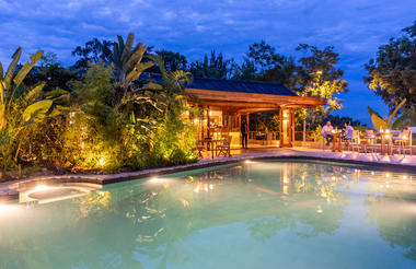 The Retreat Main Salt water pool lighting at night