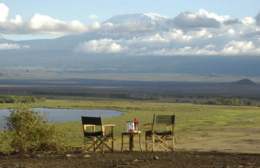 Sundowner on Observation Hill Overlooking Mt. Kilimanjaro