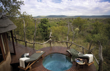 Private swimming pool, often interrupted by elephants walking past