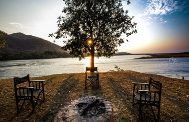 Fire pit on the river bank