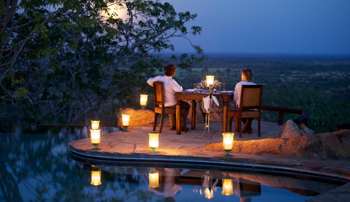 Romantic moon-lit dinner by the infinity pool