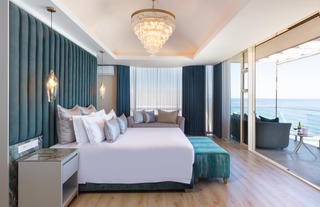 Penthouse Suite Bed with balcony & view