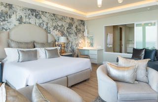 Sea Facing Suite bed & lounge arearea