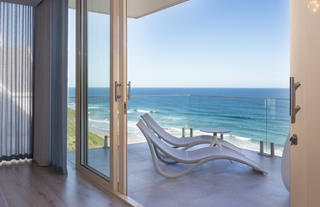 Superior Sea Facing Suite balcony with loungers