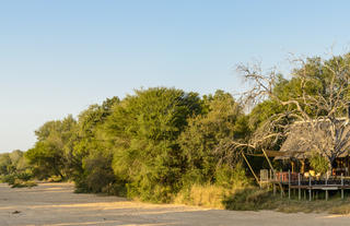 Rhino Post Safari Lodge overlooking the dry river bed