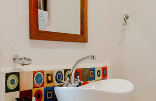 Ensuite Bathroom - Featuring Sinks, bath, shower and toilet.