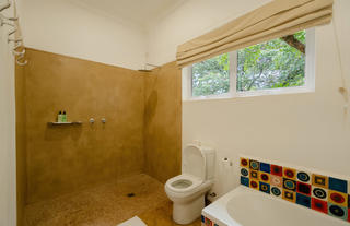 Ensuite Bathroom - Featuring Sinks, bath, shower and toilet.