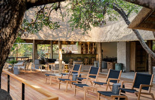 Deck seating overlooking riverbed 