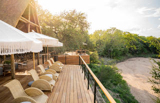 Deck seating overlooking riverbed 