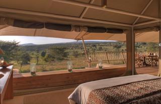 the Leopard suite/family tent with 2 bedrooms each with its own bathroom