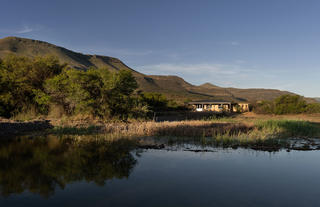 Several Karoo Suites overlook a waterhole