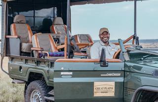 Safari vehicles at Mara Nyika Camp
