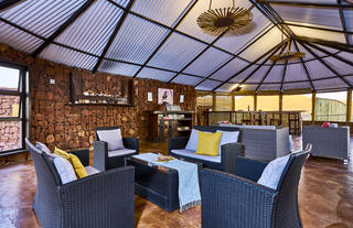 Lounge, bar and dining area at Etendeka Mountain Camp