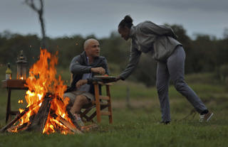 Asilia Ol Pejeta Bush Camp - Guest Enjoying Sundowners and Snacks