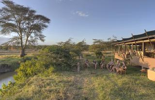 Asilia Ol Pejeta Bush Camp - Guests Enjoying Sundowners at the Main Area