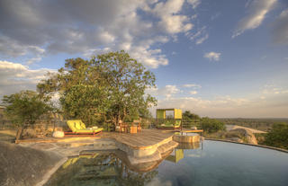 the unique rock pool overlooking the Serengeti plains