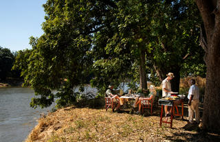 Mana River Camp - Lunch on the river bank