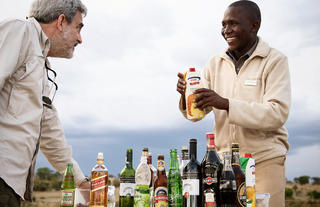 Olakira Camp - Guest enjoying sundowners