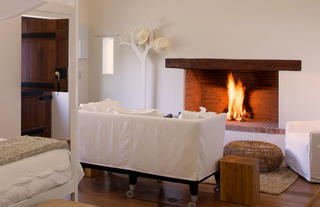 Fireplace view in one of our Double Room Cottages