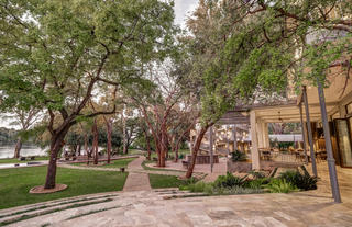 Garden pathways and al fresco bar and dining