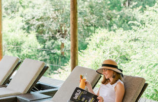 Moditlo River Lodge swimming pool lounge chairs