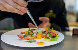 Chef preparing a seafood starter