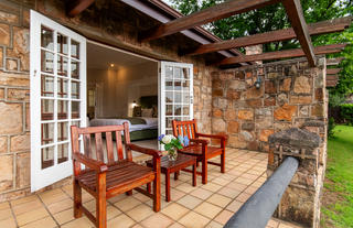 Each room has its own private patio that looks out onto the surrounding estate