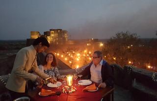 Private al-fresco champion dinner at Dhikhola fort surrounded by lakes