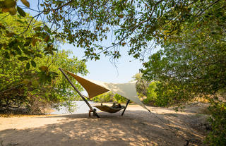 Hammock on lagoon beach