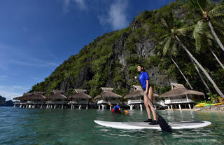 Stand up paddle boaring at the beachfront