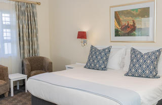 The Beach Hotel Bedroom