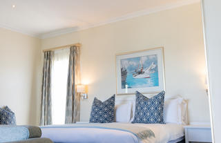 The Beach Hotel Bedroom