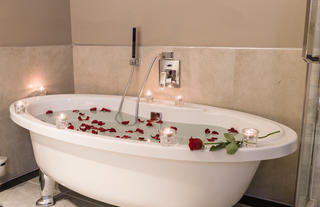 A romantic bathtub in our luxury suite