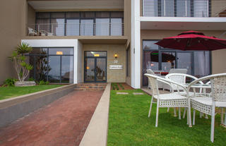 Enjoy a wonderful view over the lagoon from the outside patio