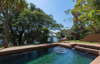 Swimming pool and loungers