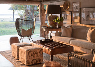 The lounge area evokes an atmosphere of a bygone safari era