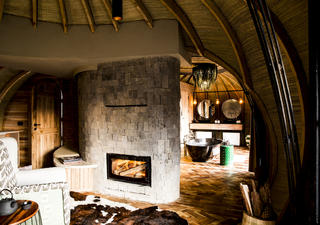 Cosy fireplaces are standard in each Forest Villa