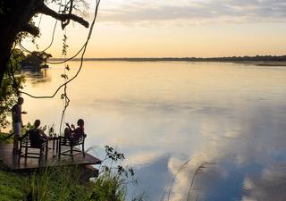 End your day in the bush off watching the sun set over the Zambezi River and its escarpment.