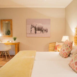 Unsere schönen Safari-Suiten im Safari-Stil bieten Platz für 2, 3 oder 4 Personen